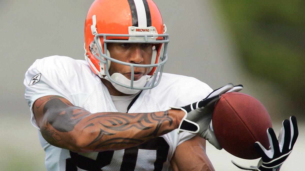 FILE - In this July 27, 2006 file photo, Cleveland Browns' Kellen Winslow Jr. catches a pass during NFL football training camp practice in Berea, Ohio. Winslow pleaded guilty Monday, Nov. 4, 2019, to raping an unconscious teen and sexual battery involving a 54-year-old hitchhiker. (AP Photo/Mark Duncan, File)