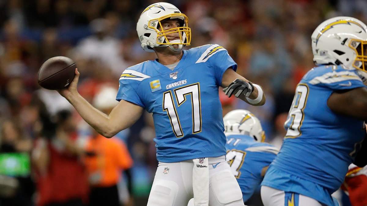 Los Angeles Chargers quarterback Philip Rivers throws a pass during the first half of an NFL football game against the Kansas City Chiefs Monday, Nov. 18, 2019, in Mexico City. 