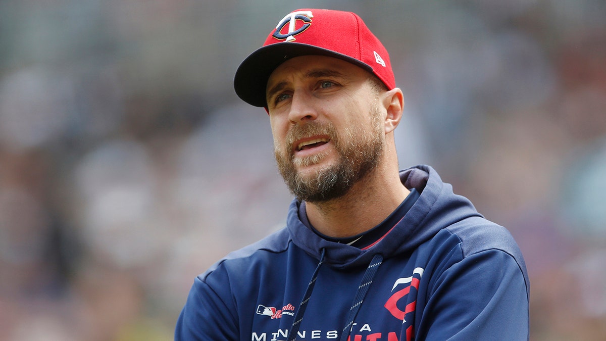 FILE - In this May 11, 2019, file photo, Minnesota Twins manager Rocco Baldelli looks up during the team's baseball game against the Detroit Tigers in Minneapolis. Baldelli has narrowly beaten out Aaron Boone of the New York Yankees to win AL Manager of the Year. (AP Photo/Jim Mone, File)