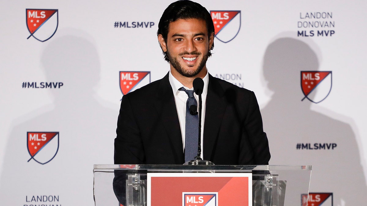 Los Angeles FC's Carlos Vela speaks during a news conference after winning the Major League Soccer Most Valuable Player award Monday, Nov. 4, 2019, in Los Angeles. Vela became the first Mexican player to win the MLS award. (AP Photo/Chris Carlson)