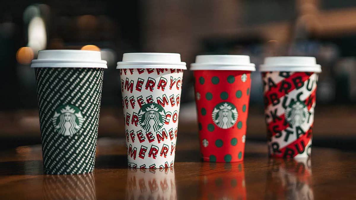 Starbucks' new designs, seen here, include (L-R) “Merry Stripes,” “Merry Dance," "Polka Dots" and “Candy Cane Stripe.”