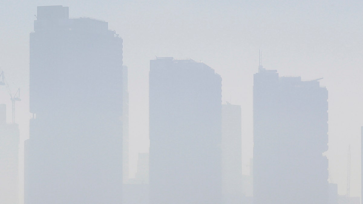 Smoke haze covers Sydney, Tuesday, Nov. 19, 2019, as wildfires burn near the city.