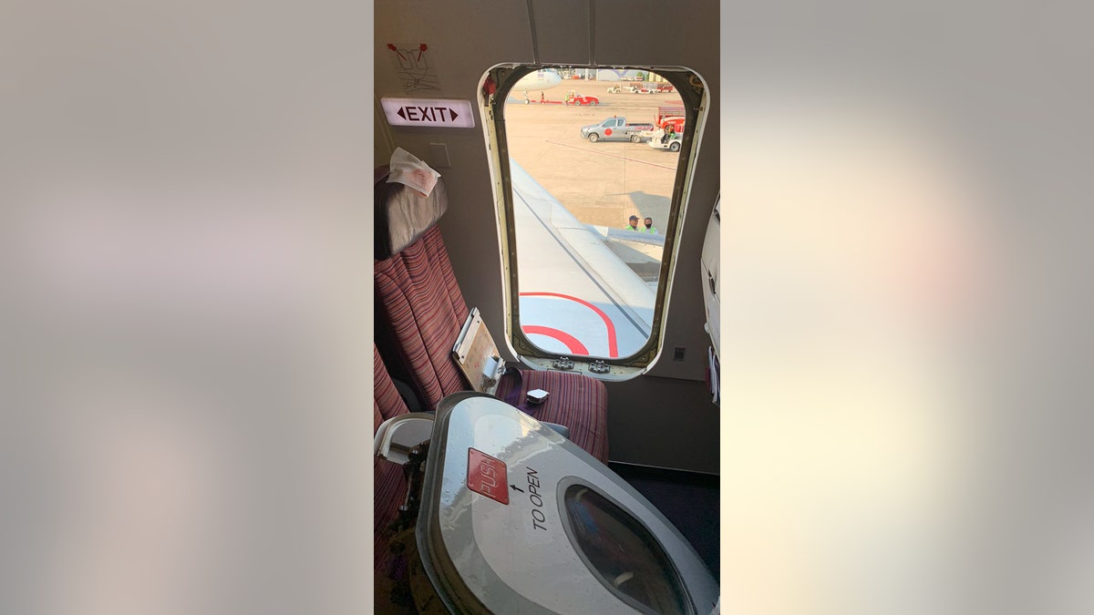 A spokesperson for Thai Smile Airways has apologized after a “crazed” passenger, who was reportedly drunk when he ripped an emergency exit door open just moments before takeoff.