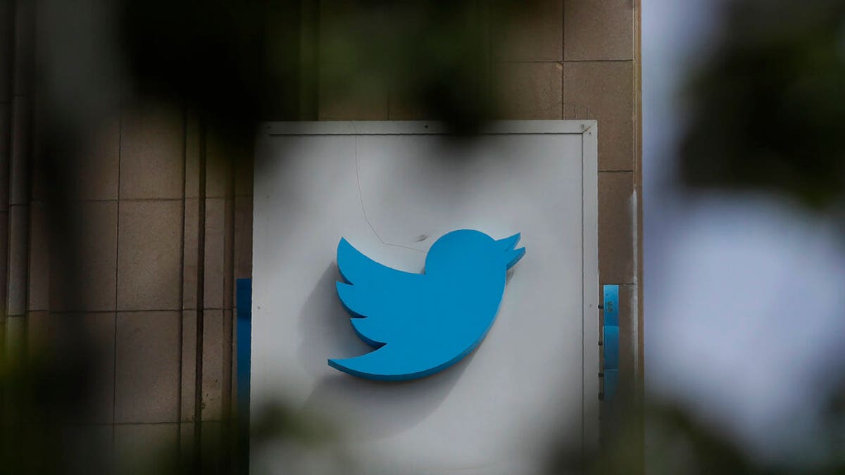 FILE - This July 9, 2019, file photo shows a sign outside of the Twitter office building in San Francisco. The Saudi government recruited two Twitter employees to get personal account information of their critics, prosecutors said Wednesday, Nov. 6, 2019. (AP Photo/Jeff Chiu, File)