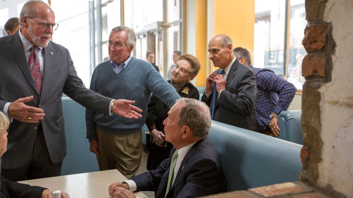 Democratic Presidential candidate Michael Bloomberg talks with patrons at the D'egg Diner during his campaign stop in Norfolk, Va., Monday, Nov. 25, 2019. (AP Photo/Bill Tiernan)