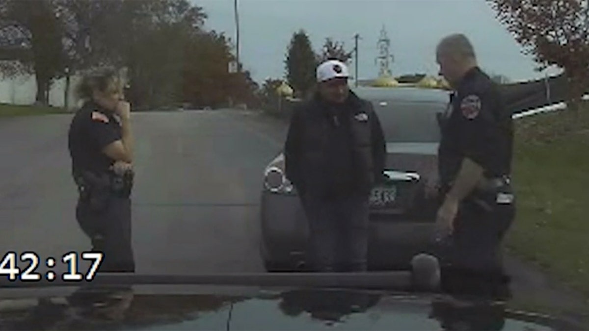 Dashcam footage shows Police administering a field sobriety test on the suspect