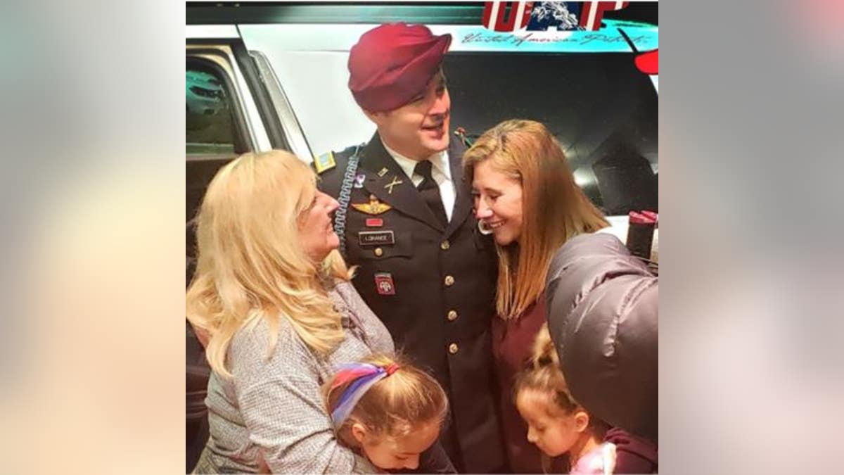 Army 1st Lt. Clint Lorance reunites with family members Friday after his release from a prison in Kansas following President Trump's decision to grant clemency. (Photo courtesy of Don Brown, attorney)