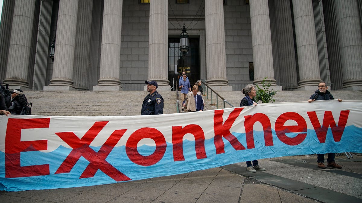 Environmental activists rally for accountability for fossil fuel companies outside of New York Supreme Court on October 22, 2019 in New York City. (Photo by Drew Angerer/Getty Images)