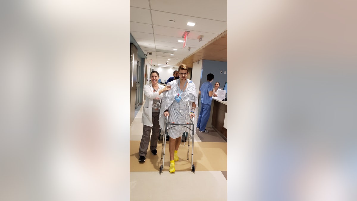 Phelps walking for the first time following sudden cardiac arrest.