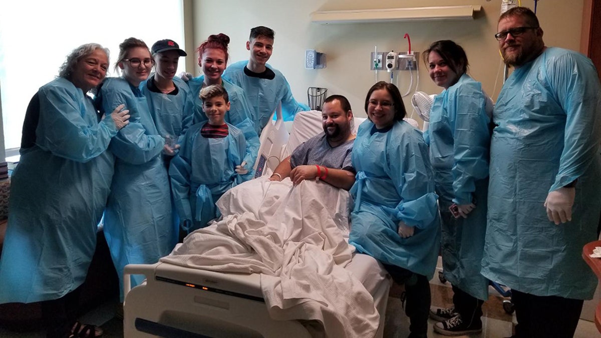 The couple had an impromptu ceremony at the hospital the groom's father was being treated at.
