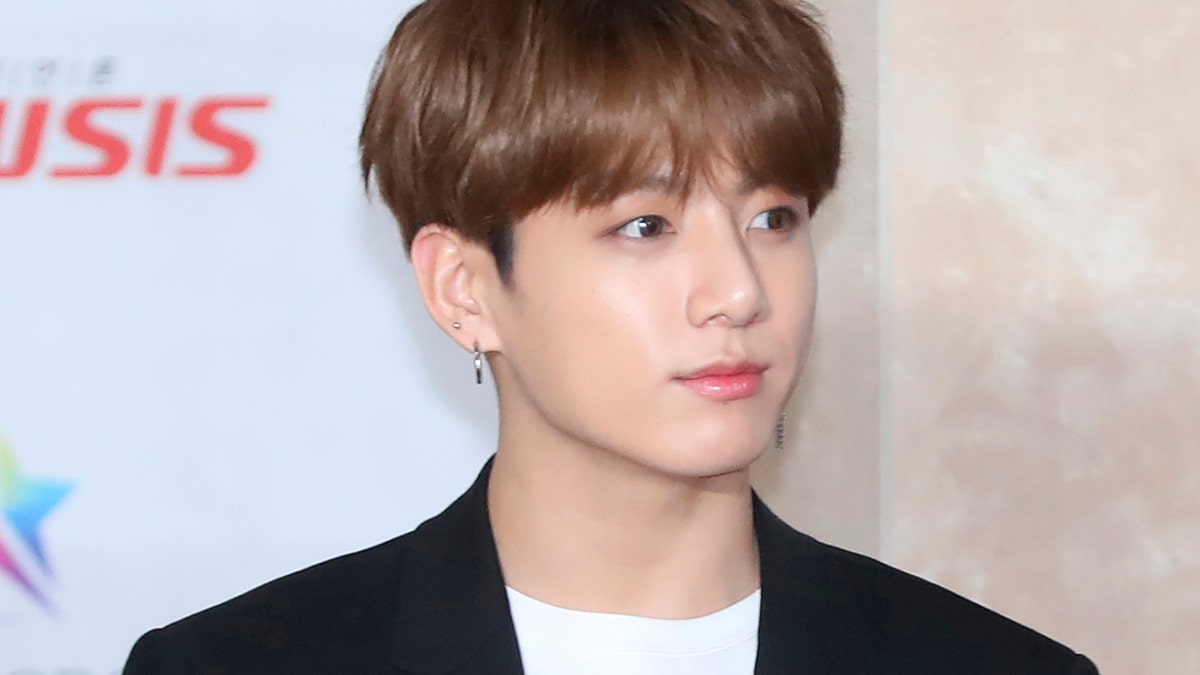 In this Nov. 28, 2018, photo, a member of K-pop group BTS, Jungkook, poses for the media at the Asia Artist Awards in Incheon, South Korea. Police say they are investigating Jungkook over a traffic accident on Saturday, Nov. 2, 2019, involving the band member and a taxi driver.