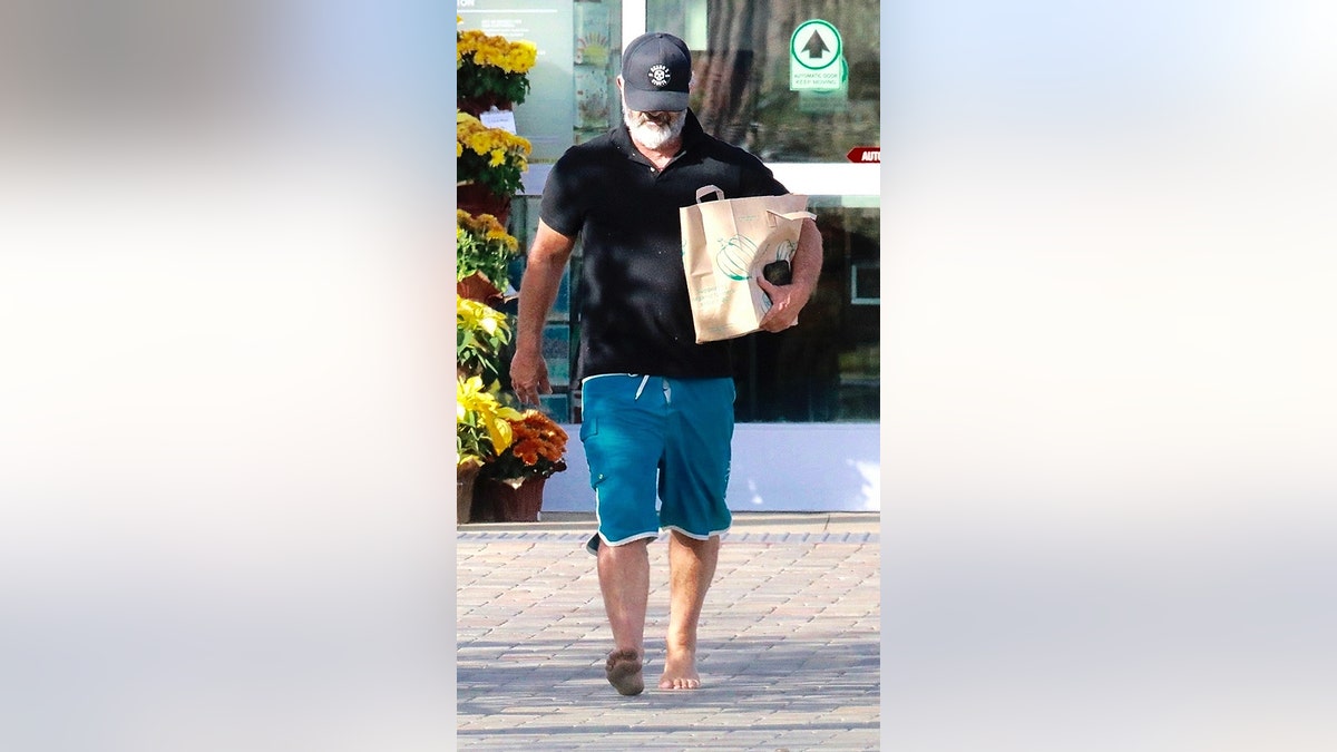 Filmmaker and actor Mel Gibson said no to his shoes as the star hit up Whole Foods to stock up on groceries in barefoot fashion on Monday, Nov. 19, 2019 in malibu, Calif.