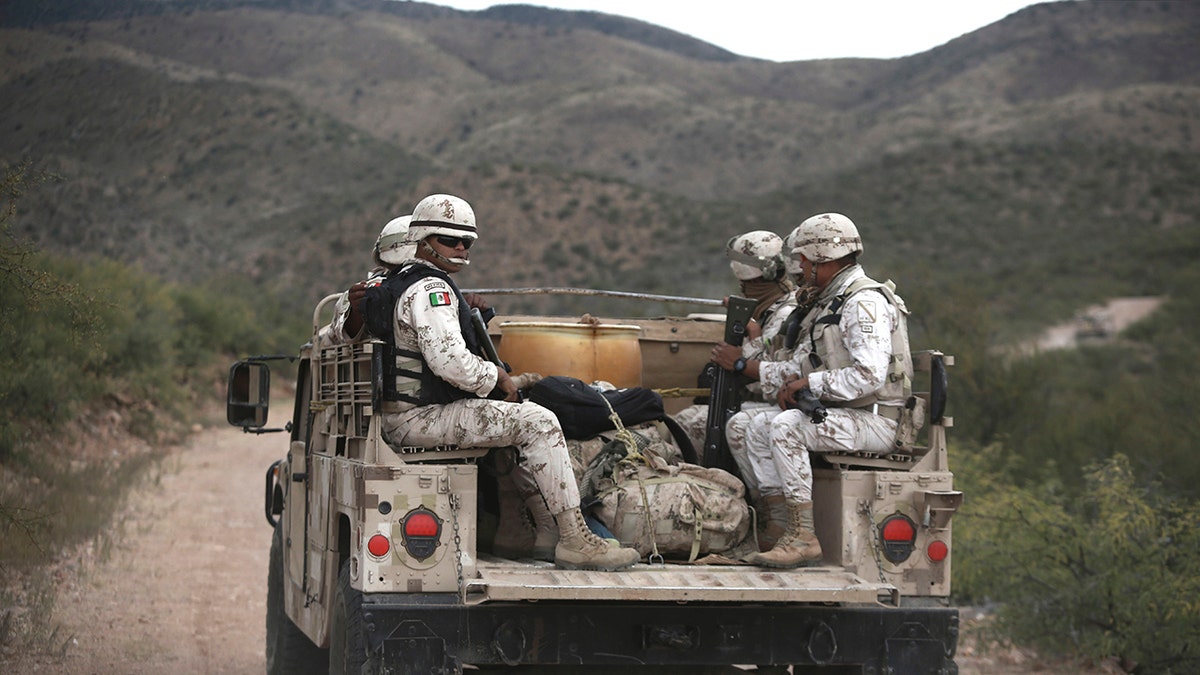 Mexican national guardsmen patrol near Bavispe, at the Sonora-Chihuahua border, Mexico, Wednesday, Nov. 6, 2019.?