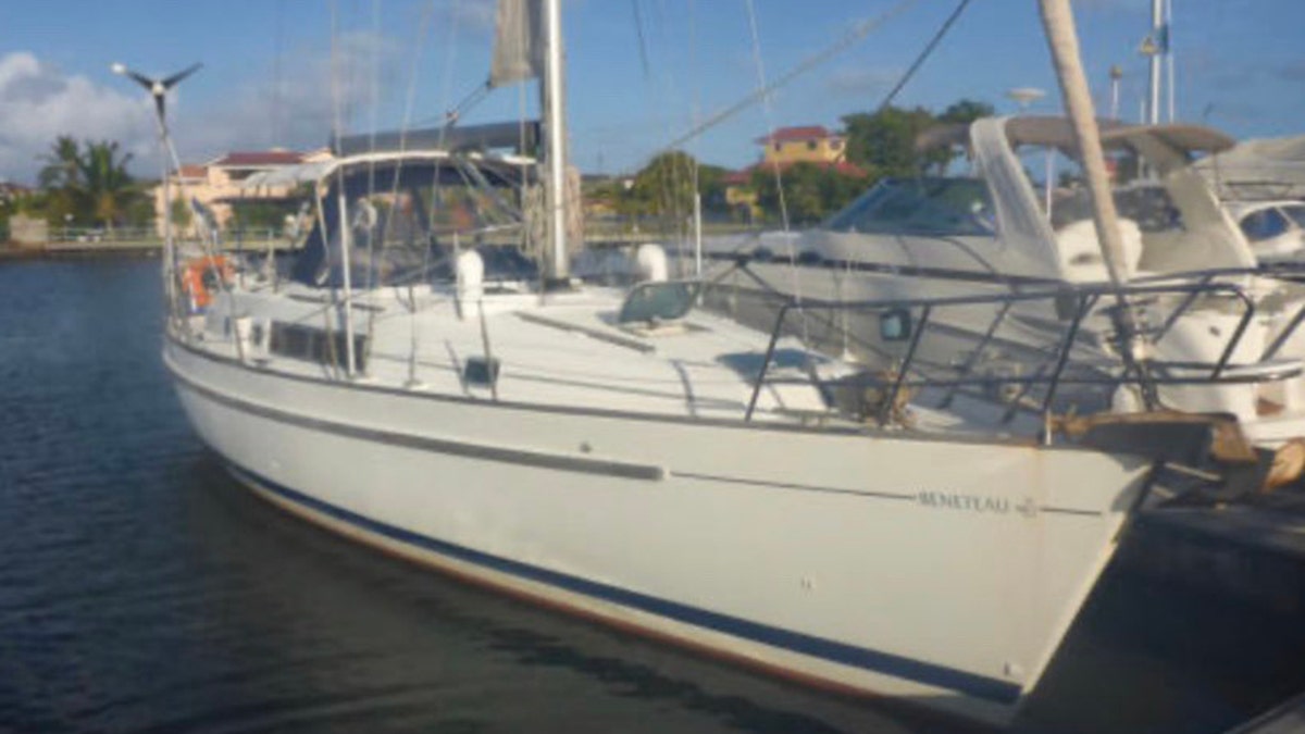 The Coast Guard said three people were on board the 40-foot sailboat named Dove.