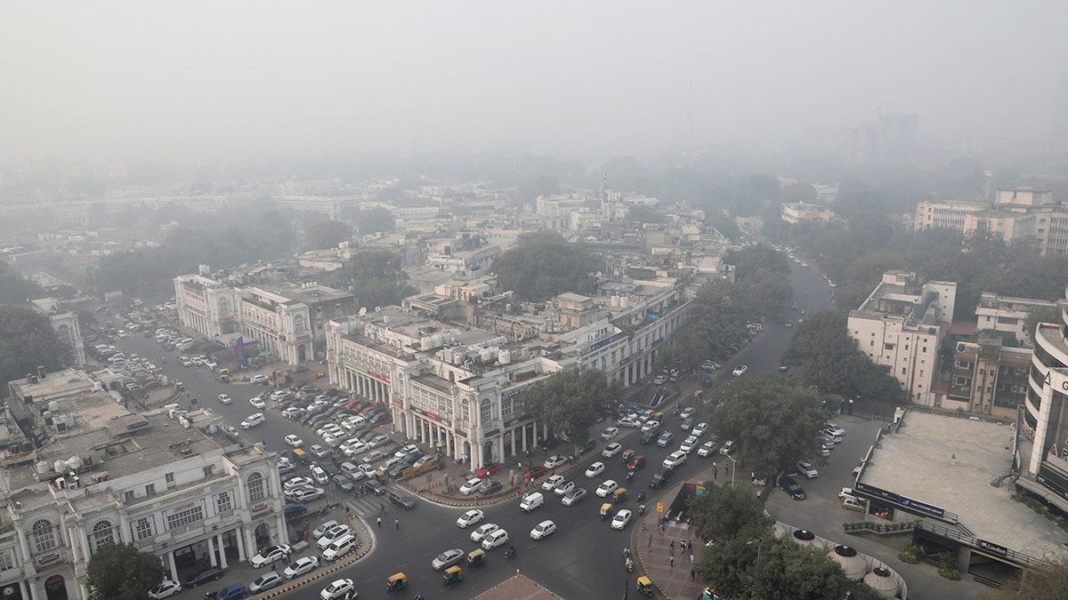 Delhi's skyline is seen enveloped in smog and dust in on Friday. (AP Photo/Manish Swarup)