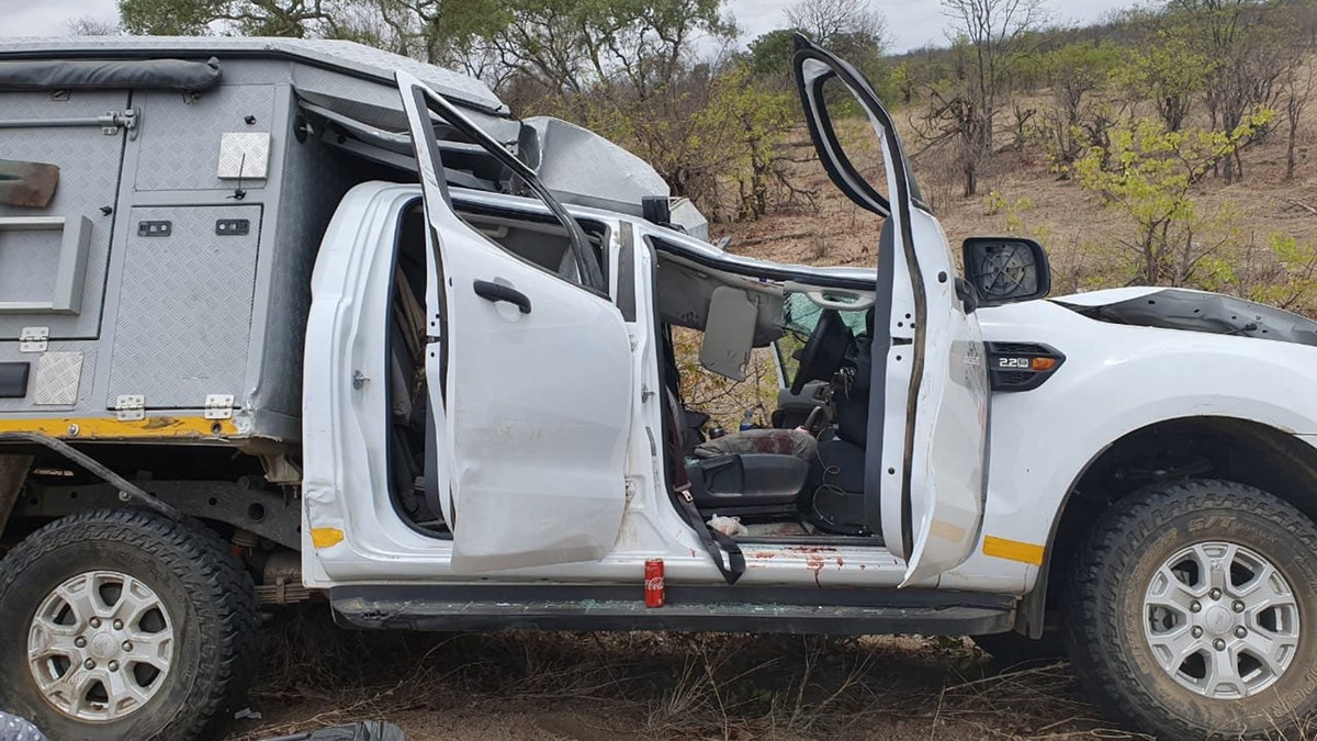 A tourist from Switzerland died after his rental safari vehicle was crushed by a giraffe that was struck by another vehicle on Saturday.