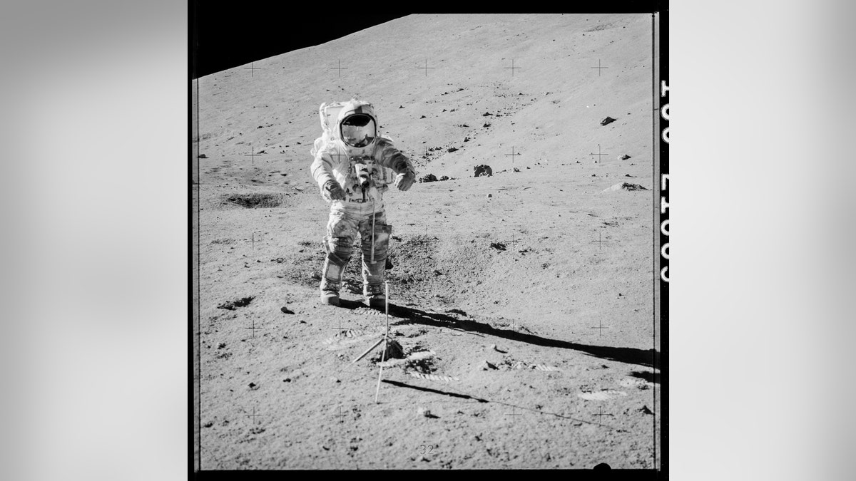 Apollo 17 astronaut Gene Cernan preparing to collect samples 73001 and 73002. (Credit: NASA)