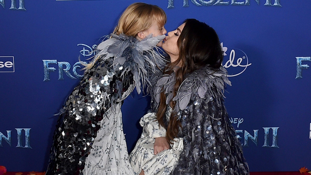 Selena Gomez plays the perfect big sister to Gracie Teefey as they twin at  'Frozen 2' premiere