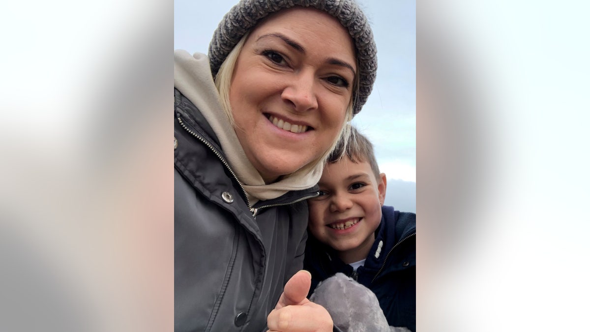 Mandy Pollard, pictured with her son, said the small spot on her nose had been there for about two years before she mentioned it to a doctor. 