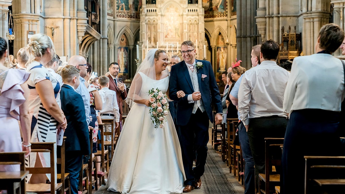 Emma Kitson walking on her wedding day.