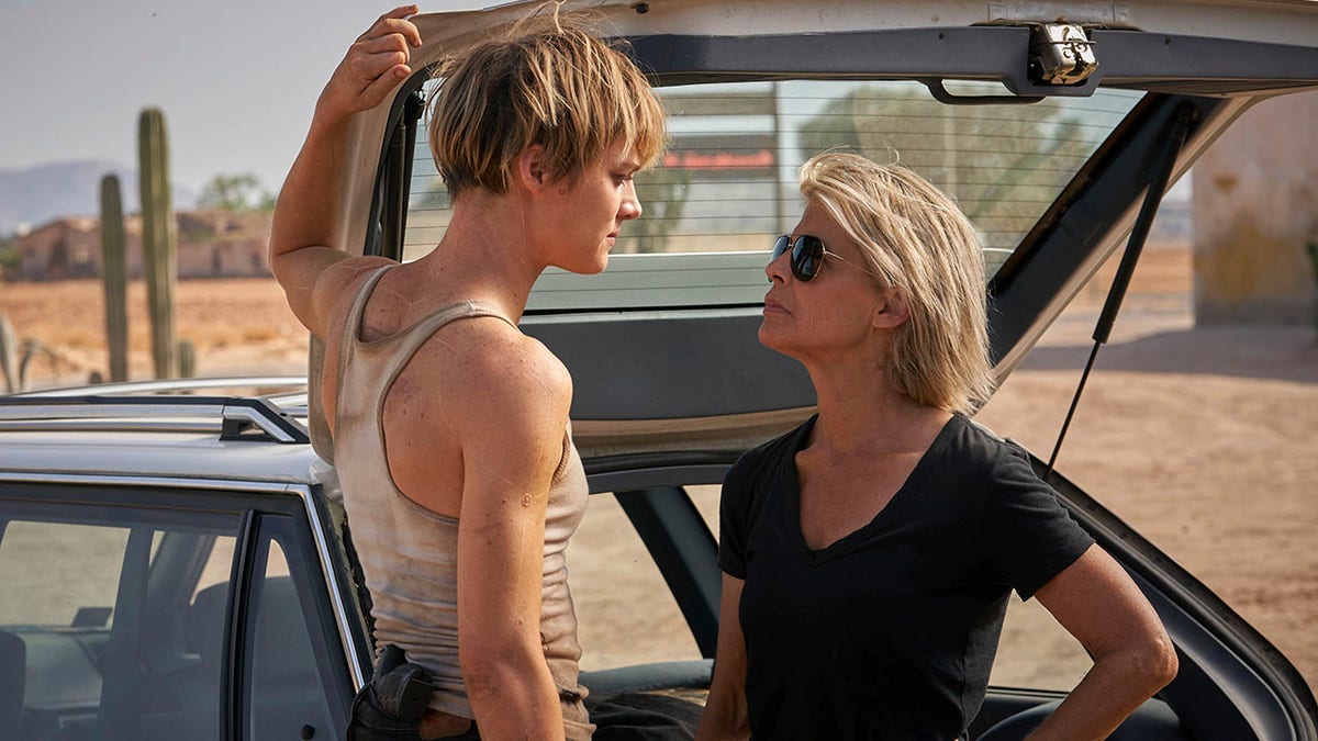 This image released by Paramount Pictures shows Mackenzie Davis, left, and Linda Hamilton in 