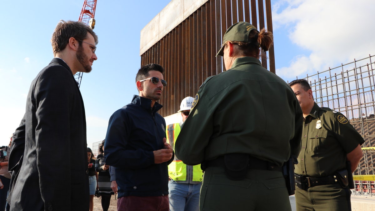 Acting DHS Secretary Chad Wolf tours new border wall construction in Texas.
