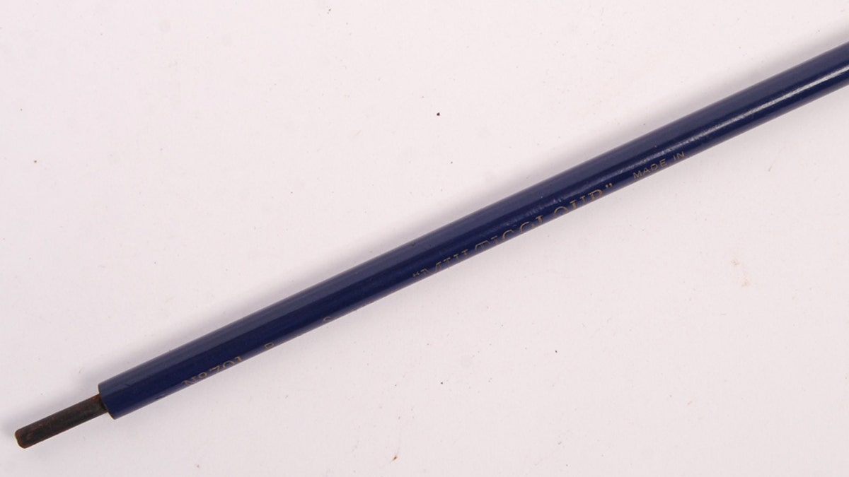 A rare original WWII Second World War SOE Special Operations Executive 'Escape &amp; Evade' secret dagger pencil. It is a normal 'Royal Sovereign No.107' blue pencil but it has a secret large, metal spike dagger inside. (Credit: SWNS)