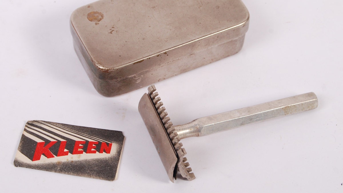 A rare WWII Second World War 1945 dated British SOE ( Special Operations Executive ) Escape &amp; Evade razor, with a compass razor blade. The blade made by Kleen, and still present within its original paper envelope. (Credit: SWNS)