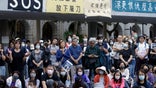 Protesters gather during a rally in Hong Kong, Friday, Nov. 15, 2019. Protesters who had barricaded themselves in a Hong Kong university this week began to leave Friday after partially clearing a road they had blocked and demanding that the government commit to going ahead with local elections on Nov. 24. (AP Photo/Achmad Ibrahim)
