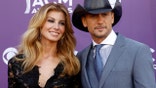 Singer Faith Hill and her husband Tim McGraw arrive at the 48th ACM Awards in Las Vegas April 7, 2013. REUTERS/Steve Marcus (UNITED STATES  Tags: Entertainment) (ACM-ARRIVALS) - RTXYCL9