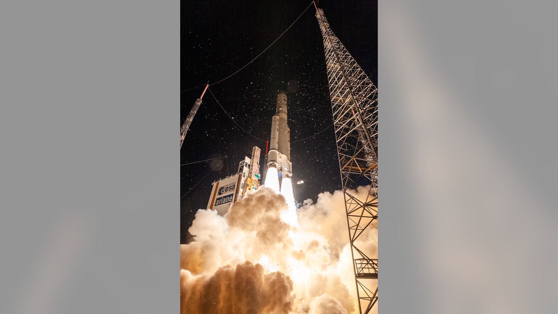 An Ariane 5 rocket with two telecom satellites, TIBA-1 and Inmarsat-GX5 lifts off from Europe’s Spaceport in French Guiana, Nov. 26, 2019.