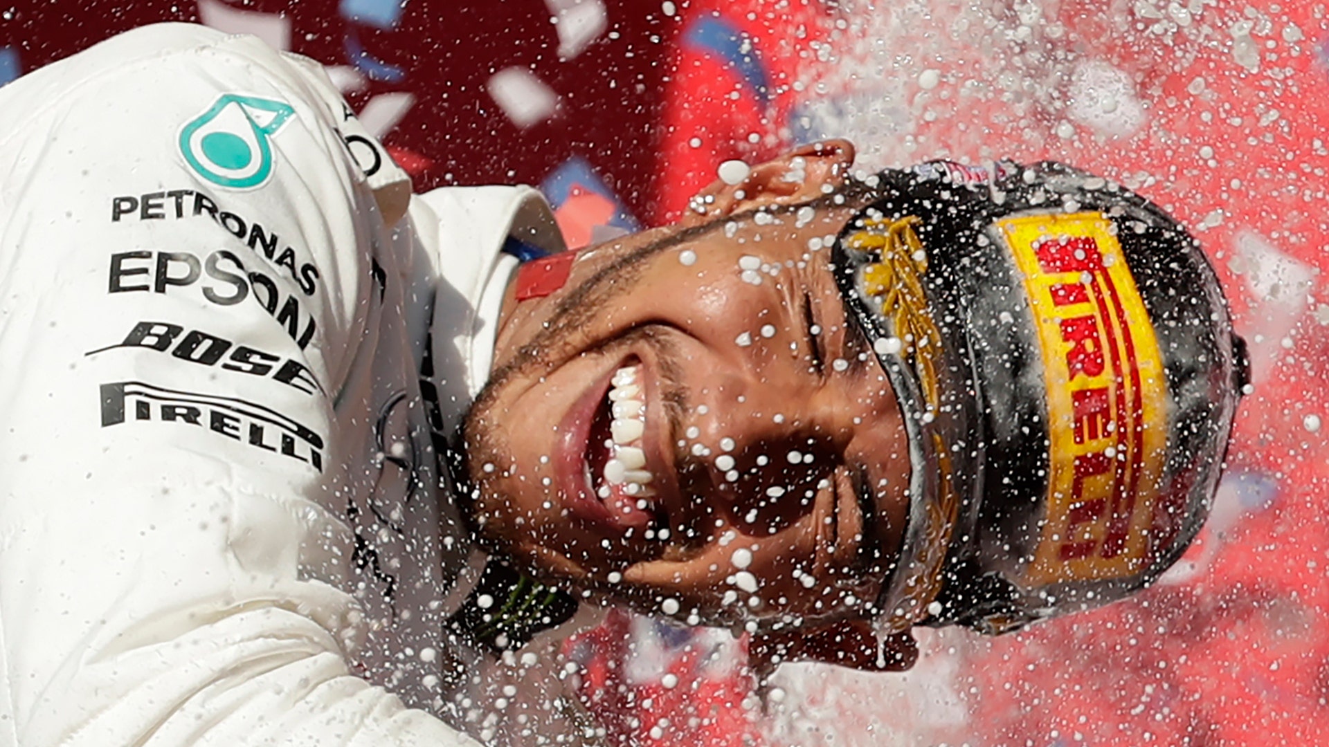 Mercedes driver Lewis Hamilton, of Britain, celebrates after placing second in the Formula One U.S. Grand Prix auto race in Austin, Texas, Nov. 3, 2019