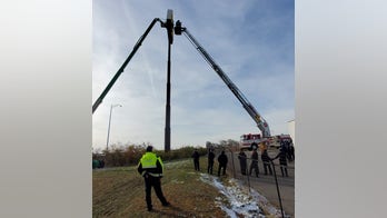 Ohio man rescued from McDonald's sign 100 feet above ground after getting stranded during maintenance job