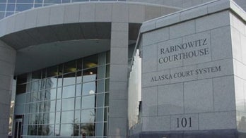 Alaska woman accused of stealing her gun during trial on firearm charges