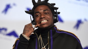 Rapper Kodak Black sentenced to more than 3 years in weapons case