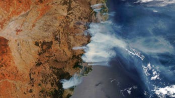 Australian firefighter accused of arson amid bushfire crisis, police say