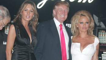 Pamela Anderson poses with Melania, Donald Trump in throwback photo