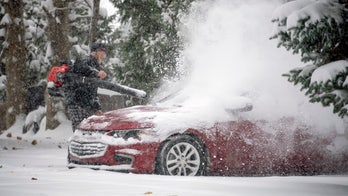 'Arctic airmass' brings record-breaking cold to Midwest, as snow that caused 4 deaths moves East