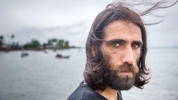 Manus Island refugee who wrote book via WhatsApp leaves detention center after six years