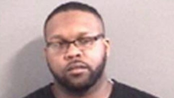 North Carolina man arrested for impersonating cop after pulling over murder suspect at gunpoint, police say