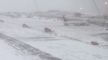 Denver airport cancels over 450 flights amid snowy weather, urges travelers to check with airlines