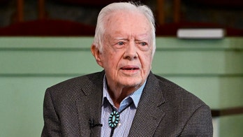 President Jimmy Carter hospitalized for procedure to reduce pressure on brain after recent falls