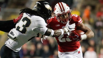 Wisconsin RB Jonathan Taylor rushes into elite company
