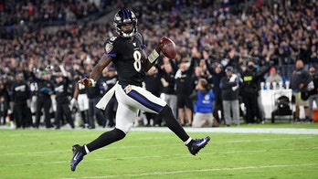 Lamar Jackson running toward record book