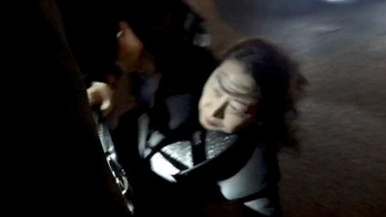 Hong Kong official assaulted in 'barbaric attack' by pro-democracy protesters in London