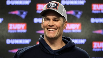 Tom Brady recalls Drew Bledsoe's 'Barney' prank during rookie season: 'The purple started seeping through the shoes'