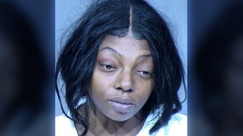 Arizona mother arrested after accidentally shooting 13-year-old son, police say