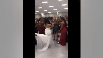 Bride uses bouquet toss at wedding to help her brother propose to his girlfriend
