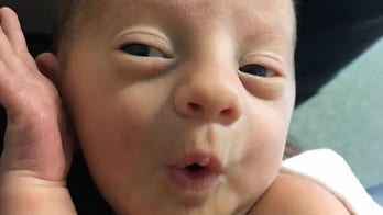 'Let the baby die' signs target Ohio family with sick infant: report