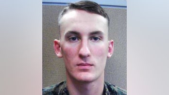 Marine deserter sought in Virginia murder hid in camper as investigators tore it apart: report